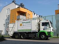 Foto eines Mehrkammer Müllwagens